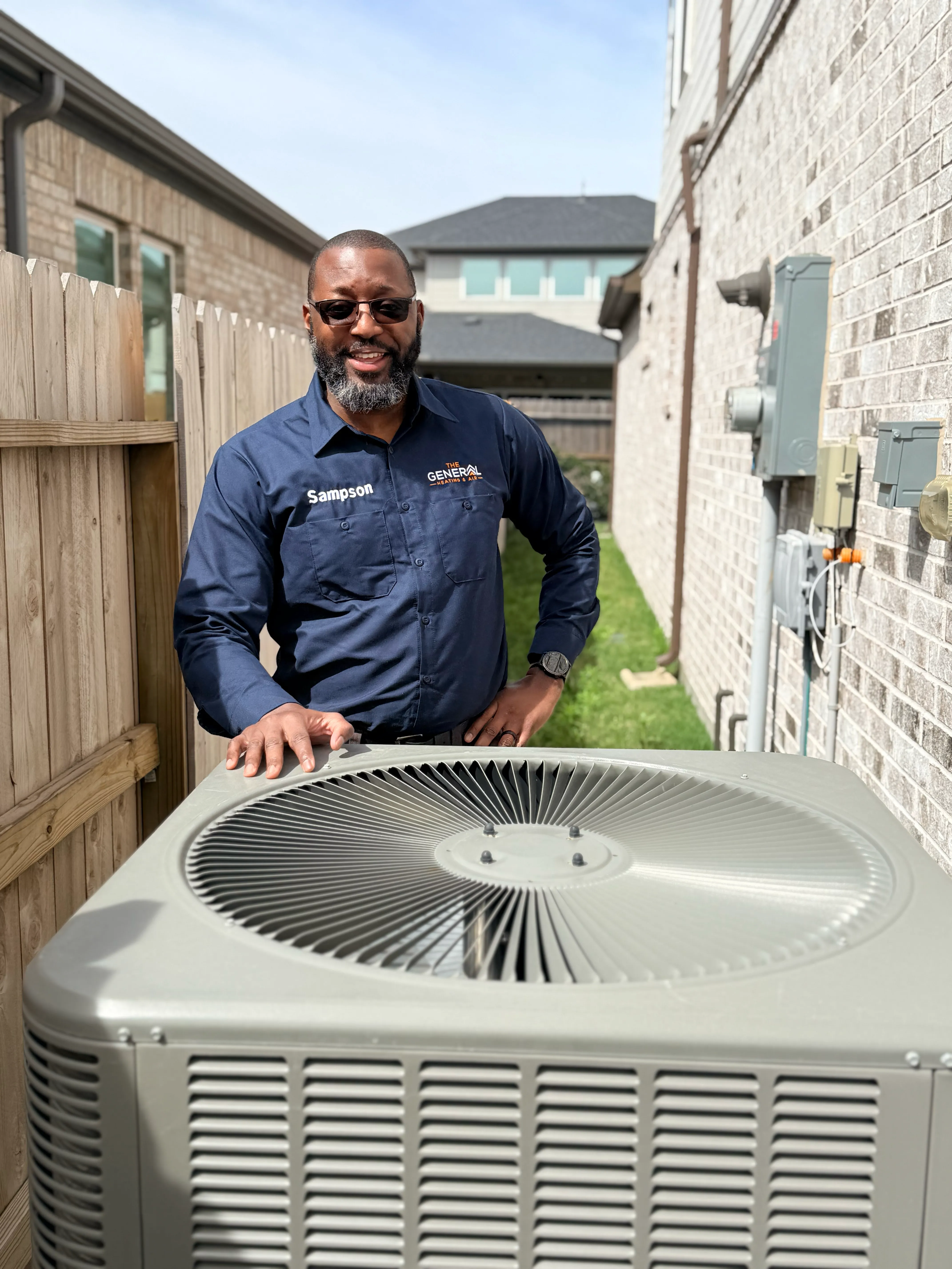 AC condenser unit serviced by The General Heating and Air
