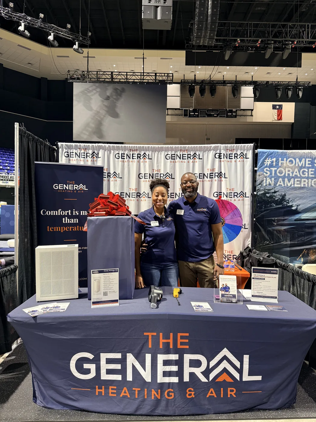 Adé Sampson and La Toya Luces-Sampson, MD at The General Heating & Air's booth at the Home and Outdoor Living Show in Cypress